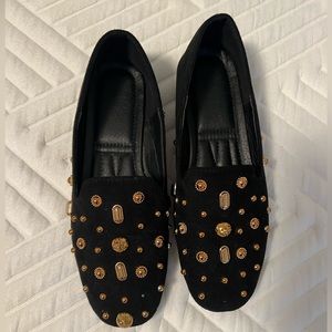 Brand new black loafers with gold studs. Beautiful shoes didn’t fit me well!